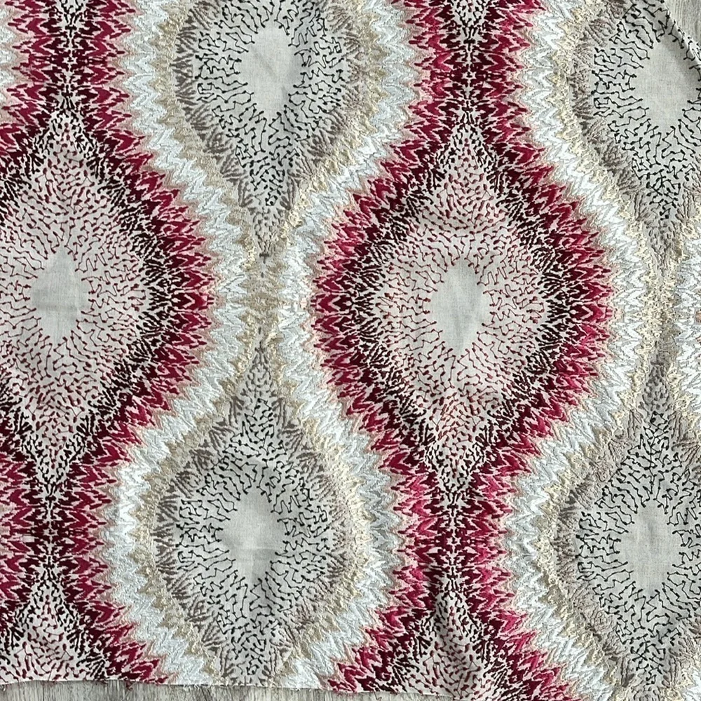 Beautiful embroidered fabric remnant quilts